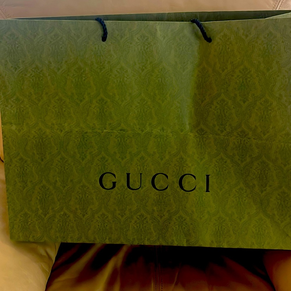 Gucci check out bag.